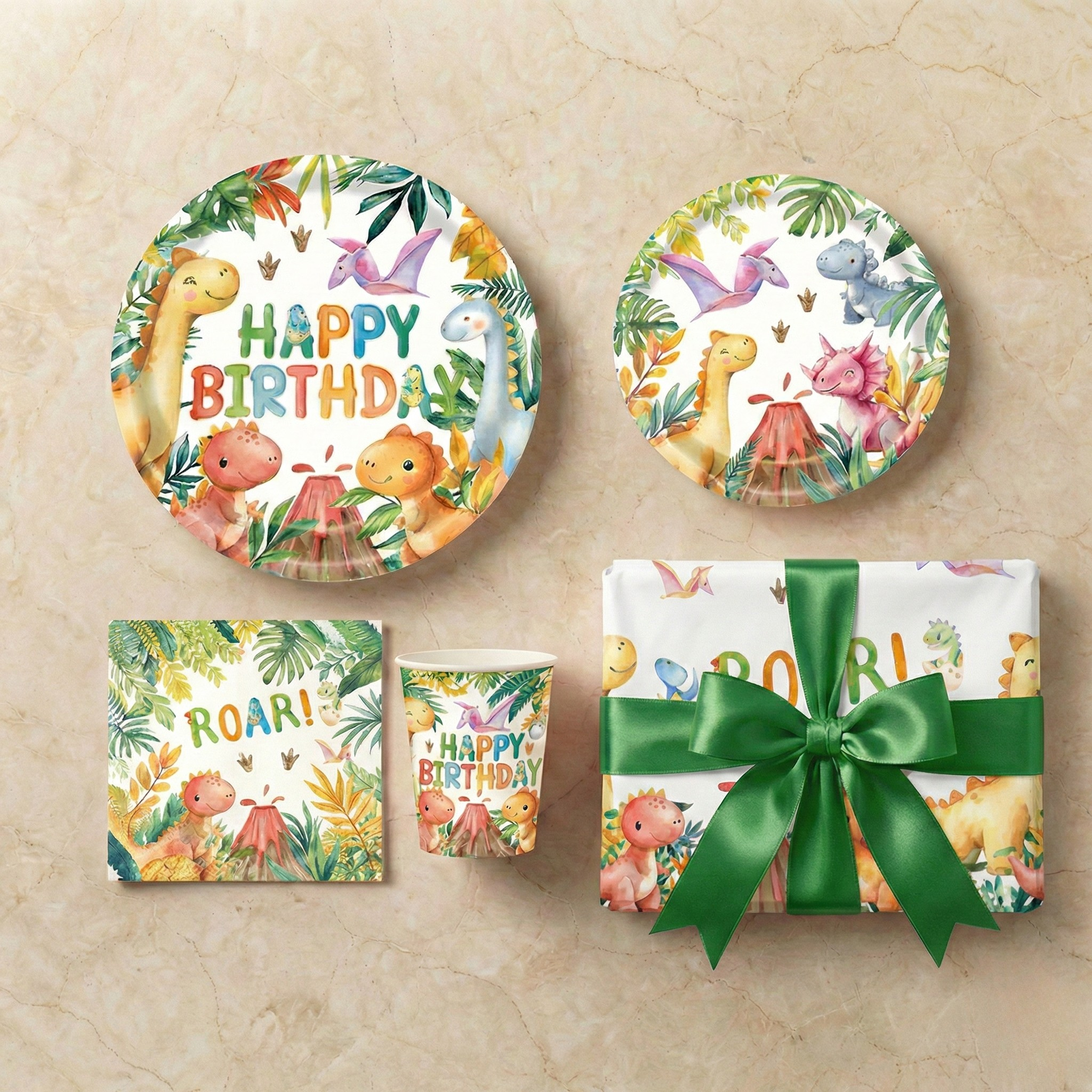 Dinosaur-print birthday plates, napkins and cups with a Roar design next to a gift with a green bow